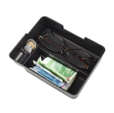 Center Console Organizer for Tesla Model 3 filled with glasses, coins and paper money