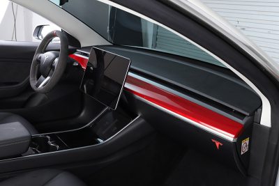 Red dashboard trim installed in car